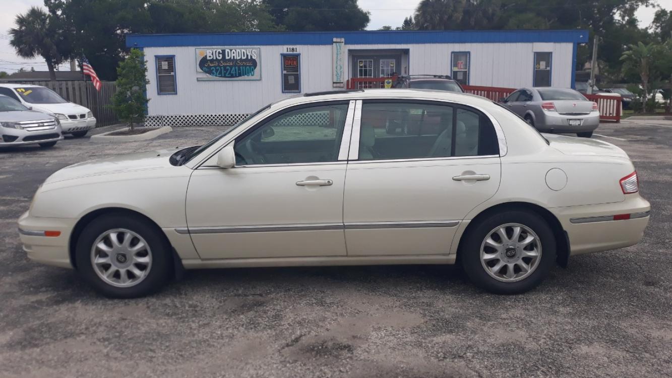 2005 White Kia Amanti Sedan (KNALD124655) with an 3.5L V6 DOHC 24V engine, 5-Speed Automatic Overdrive transmission, located at 1181 Aurora Rd, Melbourne, FL, 32935, (321) 241-1100, 28.132914, -80.639175 - Photo #0