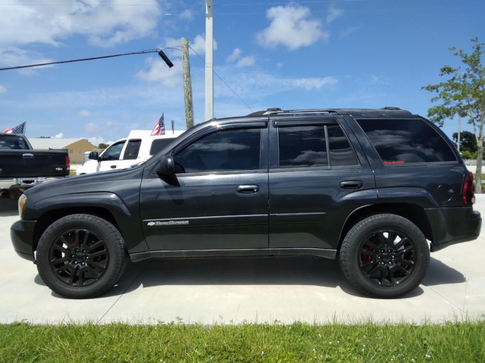 2004 Black Chevrolet TrailBlazer LS 2WD (1GNDS13S642) with an 4.2L L6 DOHC 24V engine, 4-Speed Automatic Overdrive transmission, located at 1181 Aurora Rd, Melbourne, FL, 32935, (321) 241-1100, 28.132914, -80.639175 - Photo #0