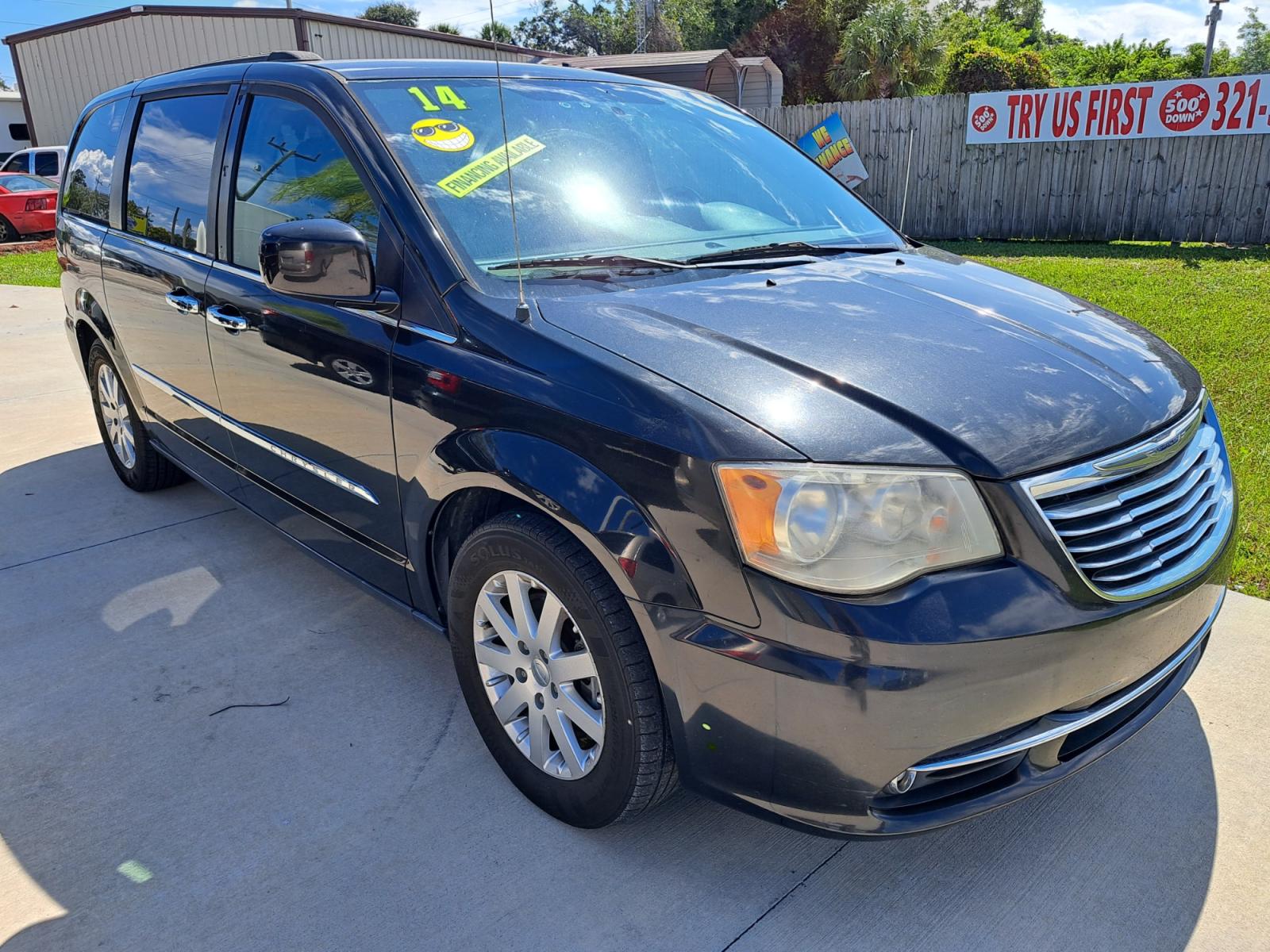 2014 Black Chrysler Town & Country Touring (2C4RC1BG8ER) with an 3.6L V6 DOHC 24V engine, 6-Speed Automatic transmission, located at 1181 Aurora Rd, Melbourne, FL, 32935, (321) 241-1100, 28.132914, -80.639175 - Photo #2