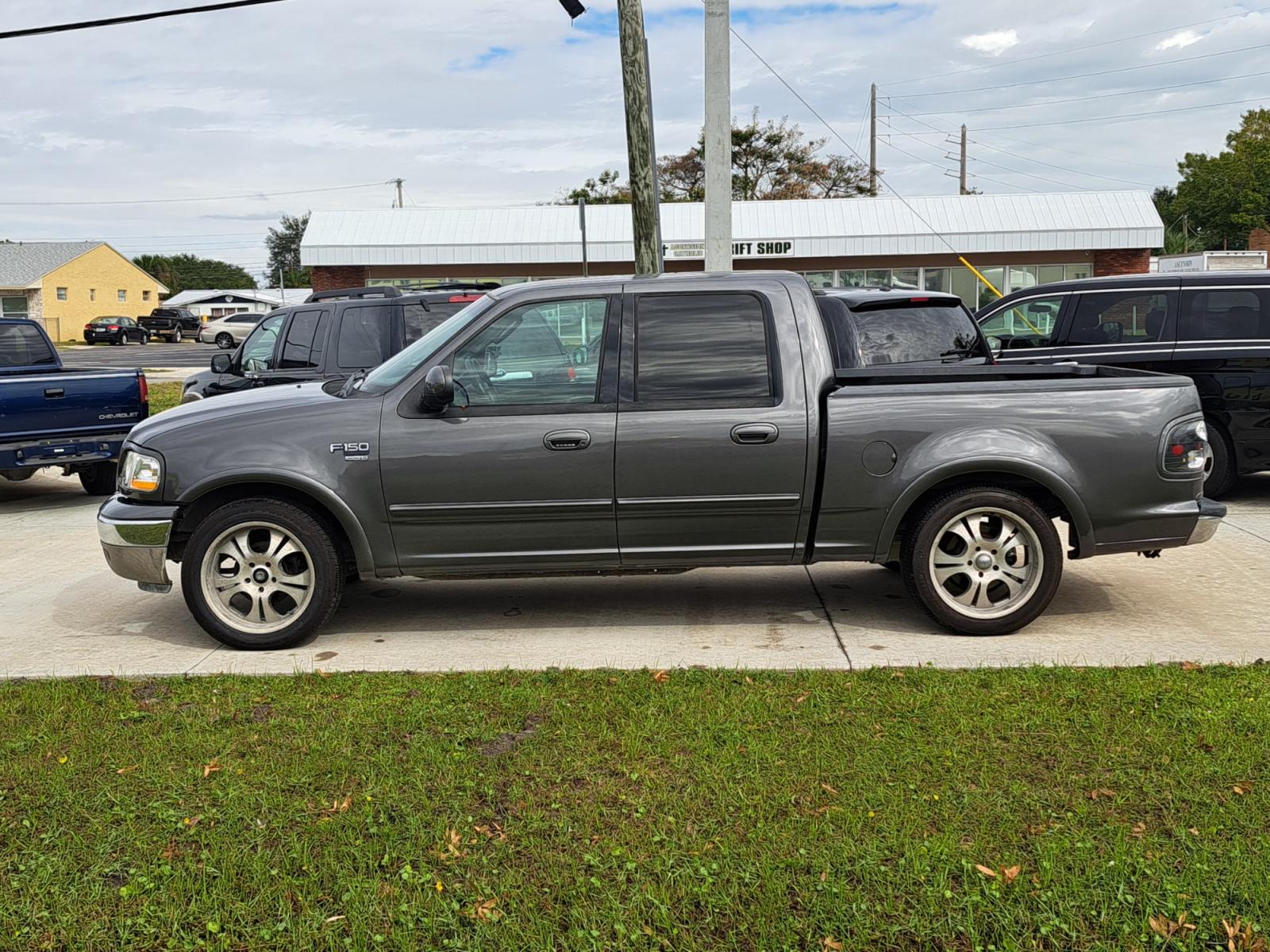 2003 Grey Ford F-150 King Ranch SuperCrew 2WD (1FTRW07L73K) with an 5.4L V8 SOHC 16V engine, 4-Speed Automatic Overdrive transmission, located at 1181 Aurora Rd, Melbourne, FL, 32935, (321) 241-1100, 28.132914, -80.639175 - Photo #0