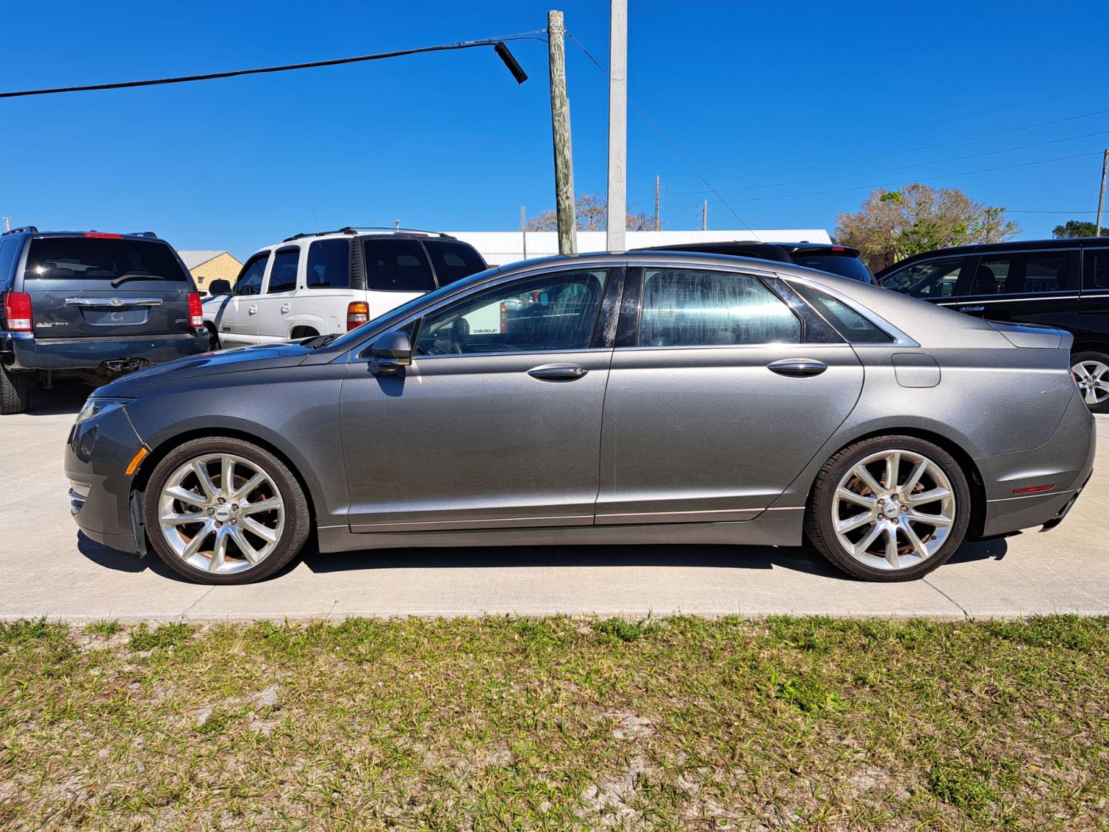 2014 Silver Lincoln MKZ AWD (3LN6L2J90ER) with an 2.0L L4 DOHC 16V engine, d Automatic transmission, located at 1181 Aurora Rd, Melbourne, FL, 32935, (321) 241-1100, 28.132914, -80.639175 - Photo #0