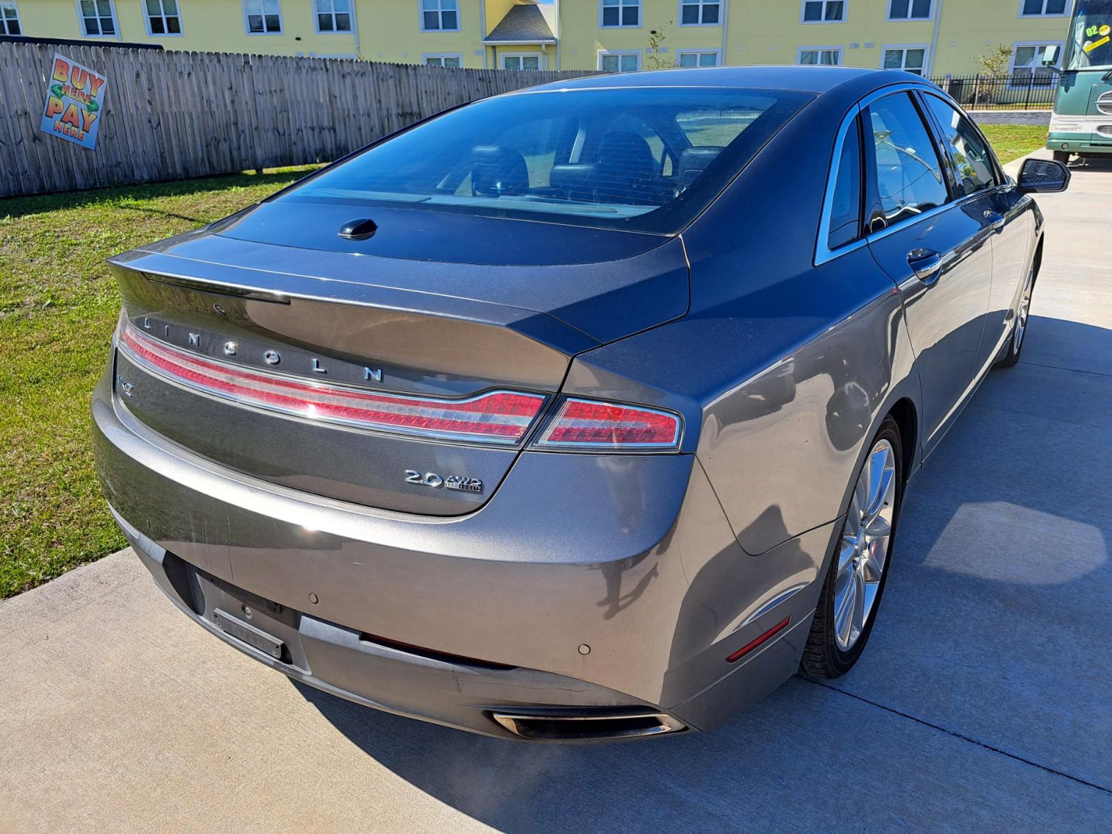 2014 Silver Lincoln MKZ AWD (3LN6L2J90ER) with an 2.0L L4 DOHC 16V engine, d Automatic transmission, located at 1181 Aurora Rd, Melbourne, FL, 32935, (321) 241-1100, 28.132914, -80.639175 - Photo #1