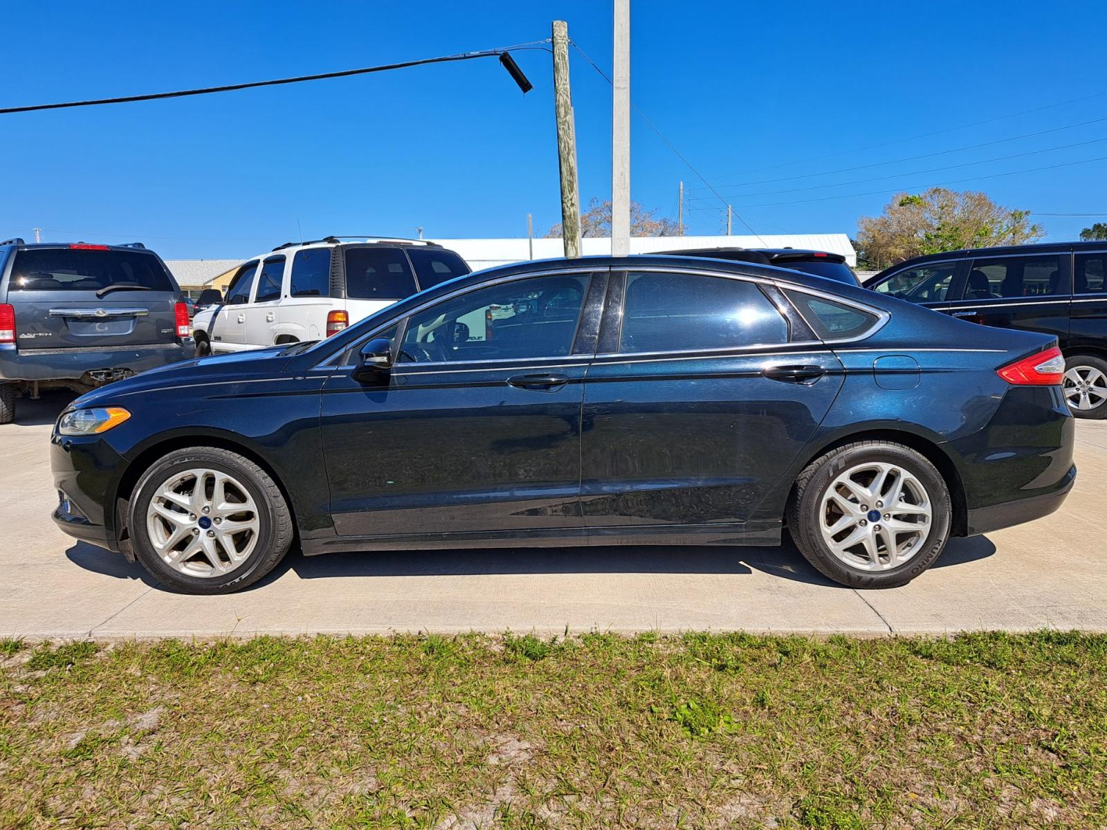 2014 Grey Ford Fusion SE (3FA6P0HD7ER) with an 1.5L L4 DOHC 16V engine, Automatic transmission, located at 1181 Aurora Rd, Melbourne, FL, 32935, (321) 241-1100, 28.132914, -80.639175 - Photo #0