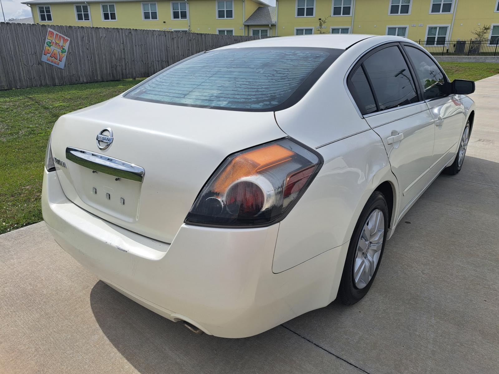 2010 White Nissan Altima 2.5 (1N4AL2AP0AN) with an 2.5L L4 DOHC 16V engine, Automatic transmission, located at 1181 Aurora Rd, Melbourne, FL, 32935, (321) 241-1100, 28.132914, -80.639175 - Photo #1
