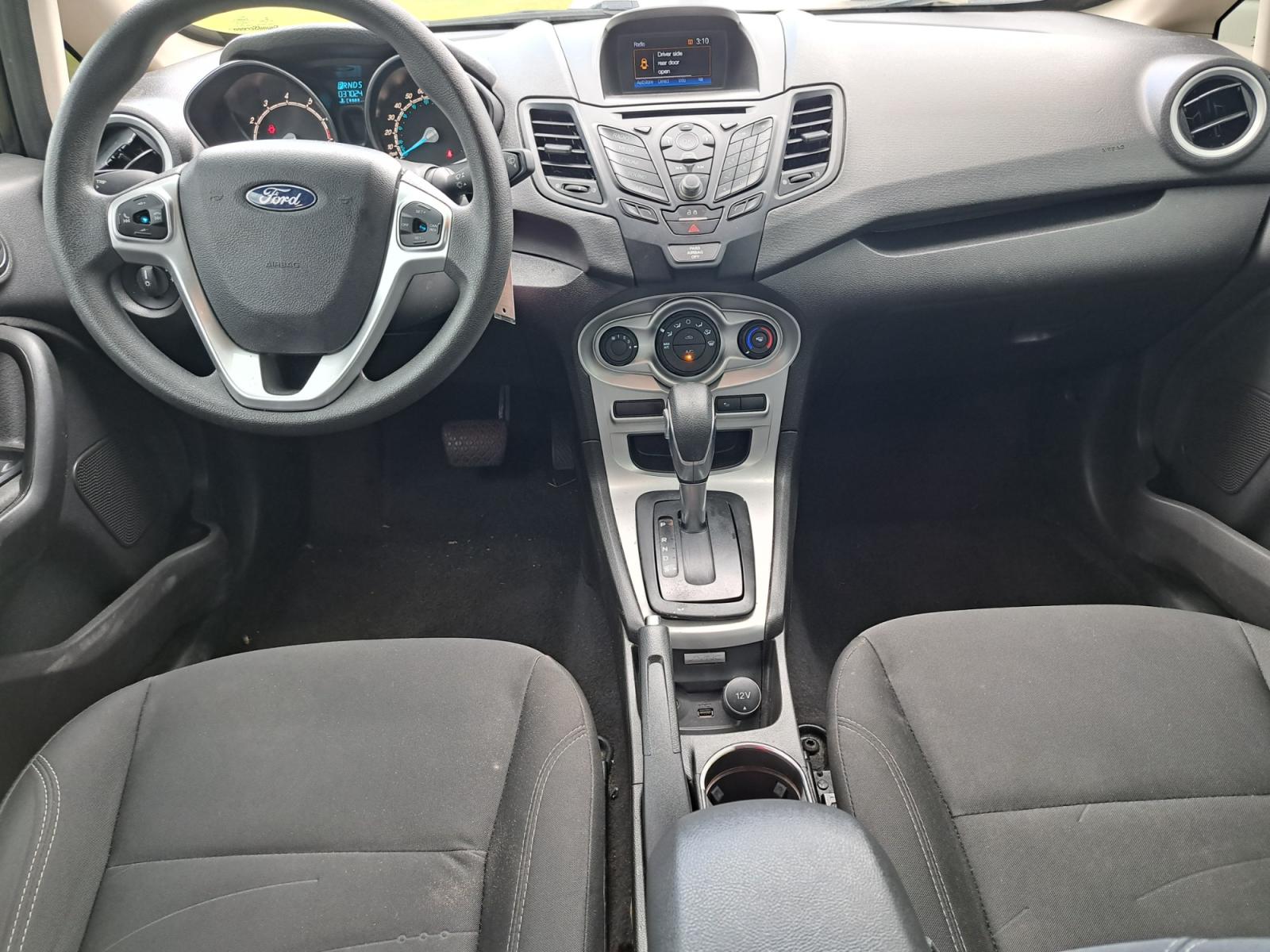 2018 Black Ford Fiesta SE Hatchback (3FADP4EJ9JM) with an 1.6L L4 DOHC 16V engine, Automatic transmission, located at 1181 Aurora Rd, Melbourne, FL, 32935, (321) 241-1100, 28.132914, -80.639175 - Photo #4