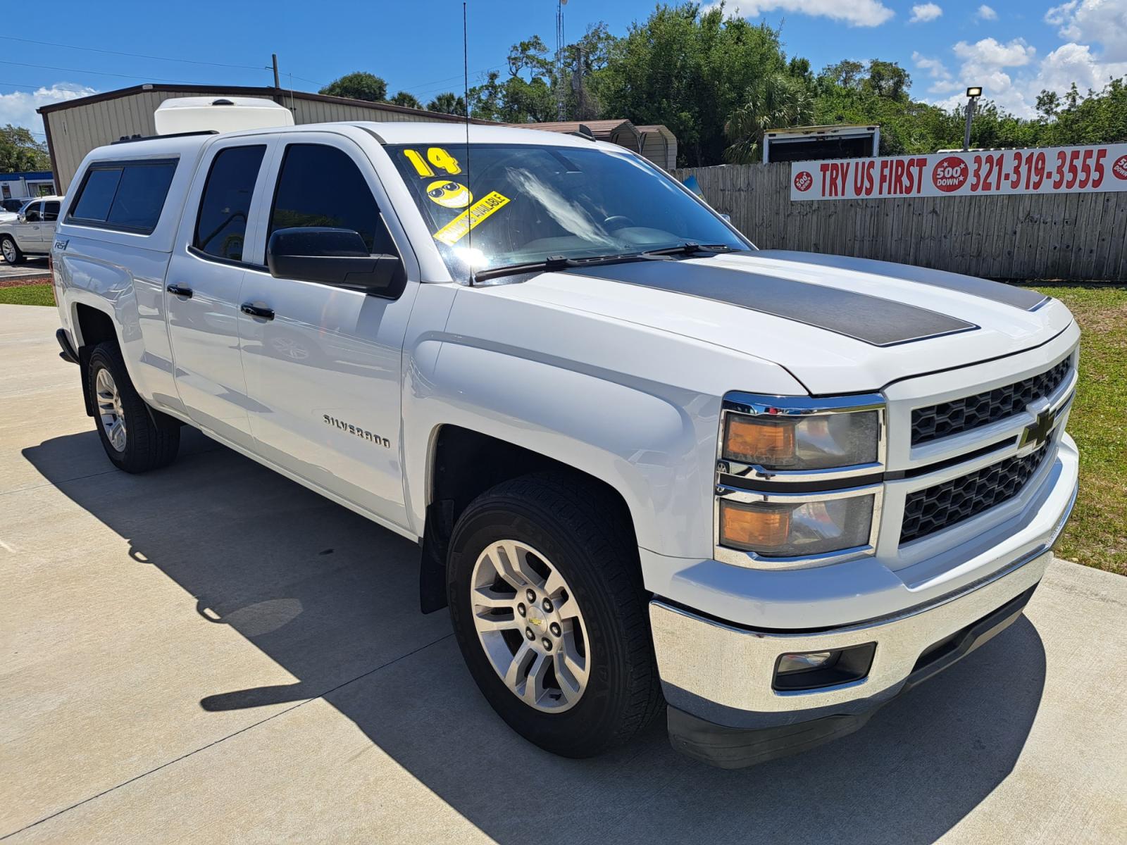 2014 White Chevrolet Silverado 1500 1LT Double Cab 2WD (1GCRCRECXEZ) with an 5.3L V8 OHV 16V engine, 6-Speed Automatic transmission, located at 1181 Aurora Rd, Melbourne, FL, 32935, (321) 241-1100, 28.132914, -80.639175 - Photo #2