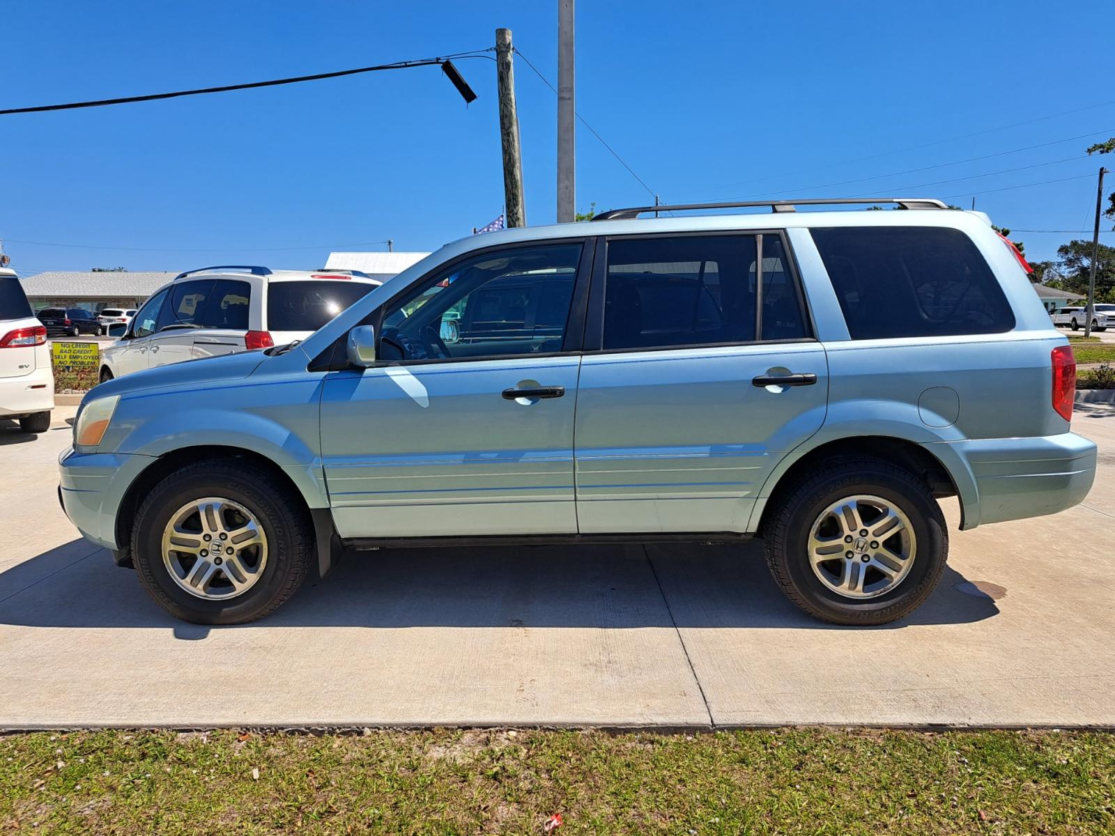 2003 Blue Honda Pilot EX w/ Leather (2HKYF18583H) with an 3.5L V6 SOHC 24V engine, 5-Speed Automatic Overdrive transmission, located at 1181 Aurora Rd, Melbourne, FL, 32935, (321) 241-1100, 28.132914, -80.639175 - Photo #0