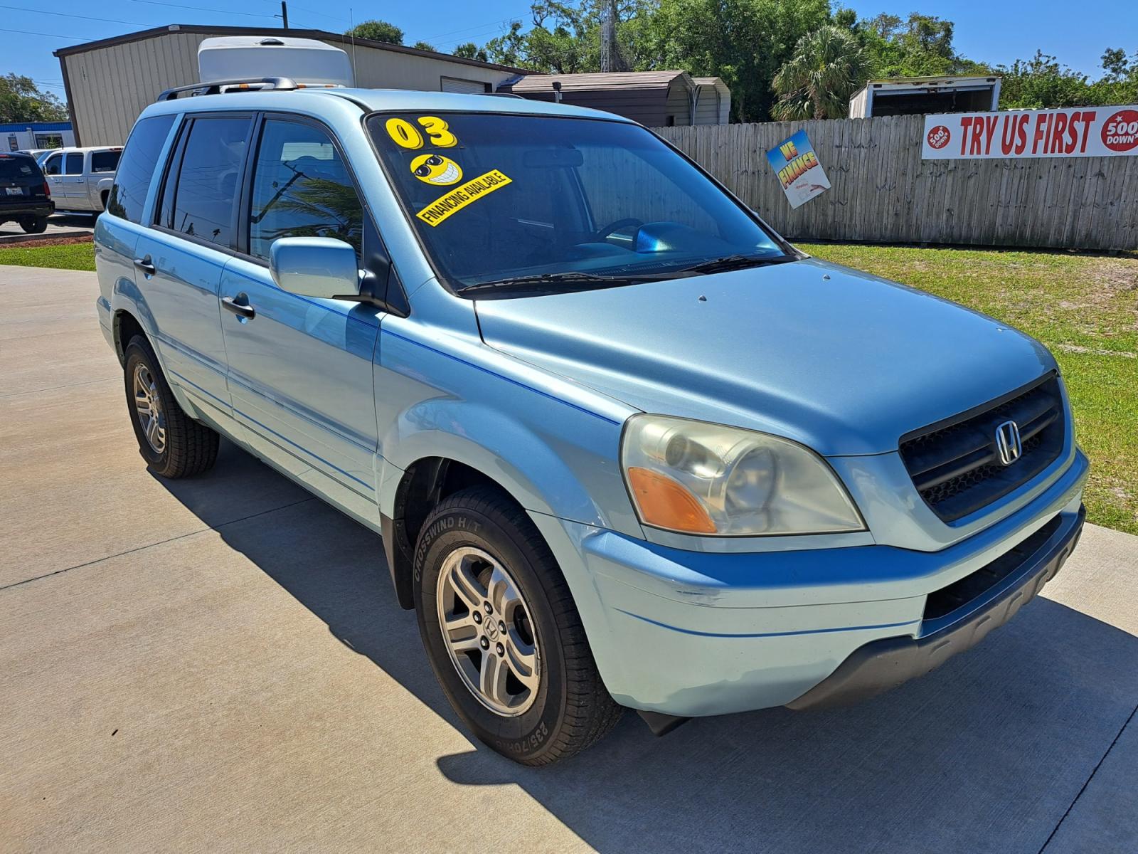 2003 Blue Honda Pilot EX w/ Leather (2HKYF18583H) with an 3.5L V6 SOHC 24V engine, 5-Speed Automatic Overdrive transmission, located at 1181 Aurora Rd, Melbourne, FL, 32935, (321) 241-1100, 28.132914, -80.639175 - Photo #2