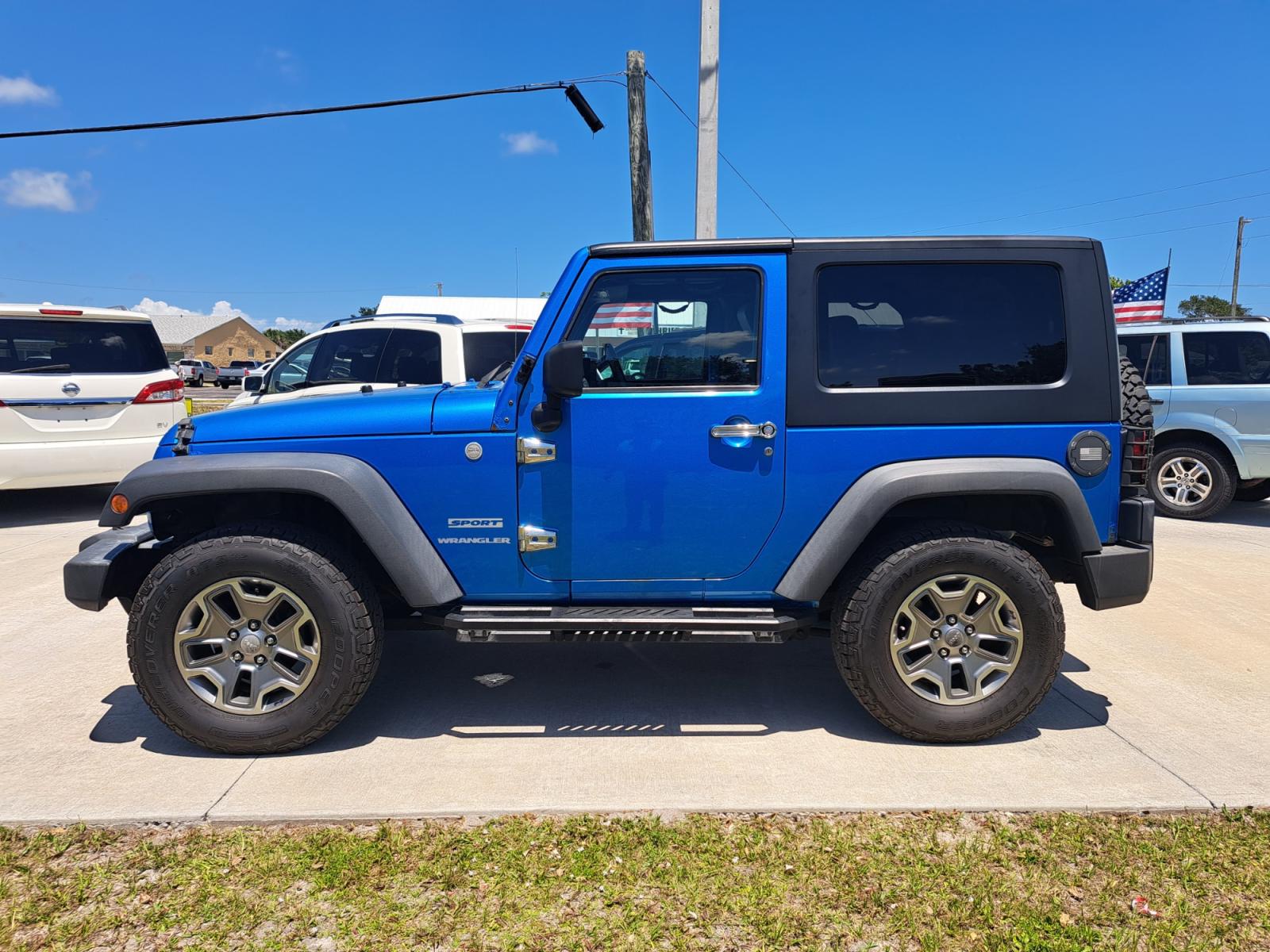 2010 Blue Jeep Wrangler Sport 4WD (1J4AA2D16AL) with an 3.8L V6 OHV 12V engine, Automatic transmission, located at 1181 Aurora Rd, Melbourne, FL, 32935, (321) 241-1100, 28.132914, -80.639175 - Photo #0
