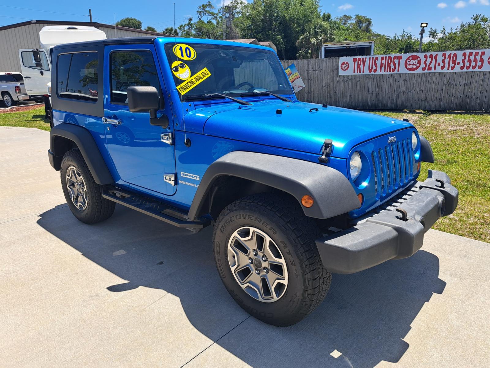 2010 Blue Jeep Wrangler Sport 4WD (1J4AA2D16AL) with an 3.8L V6 OHV 12V engine, Automatic transmission, located at 1181 Aurora Rd, Melbourne, FL, 32935, (321) 241-1100, 28.132914, -80.639175 - Photo #2