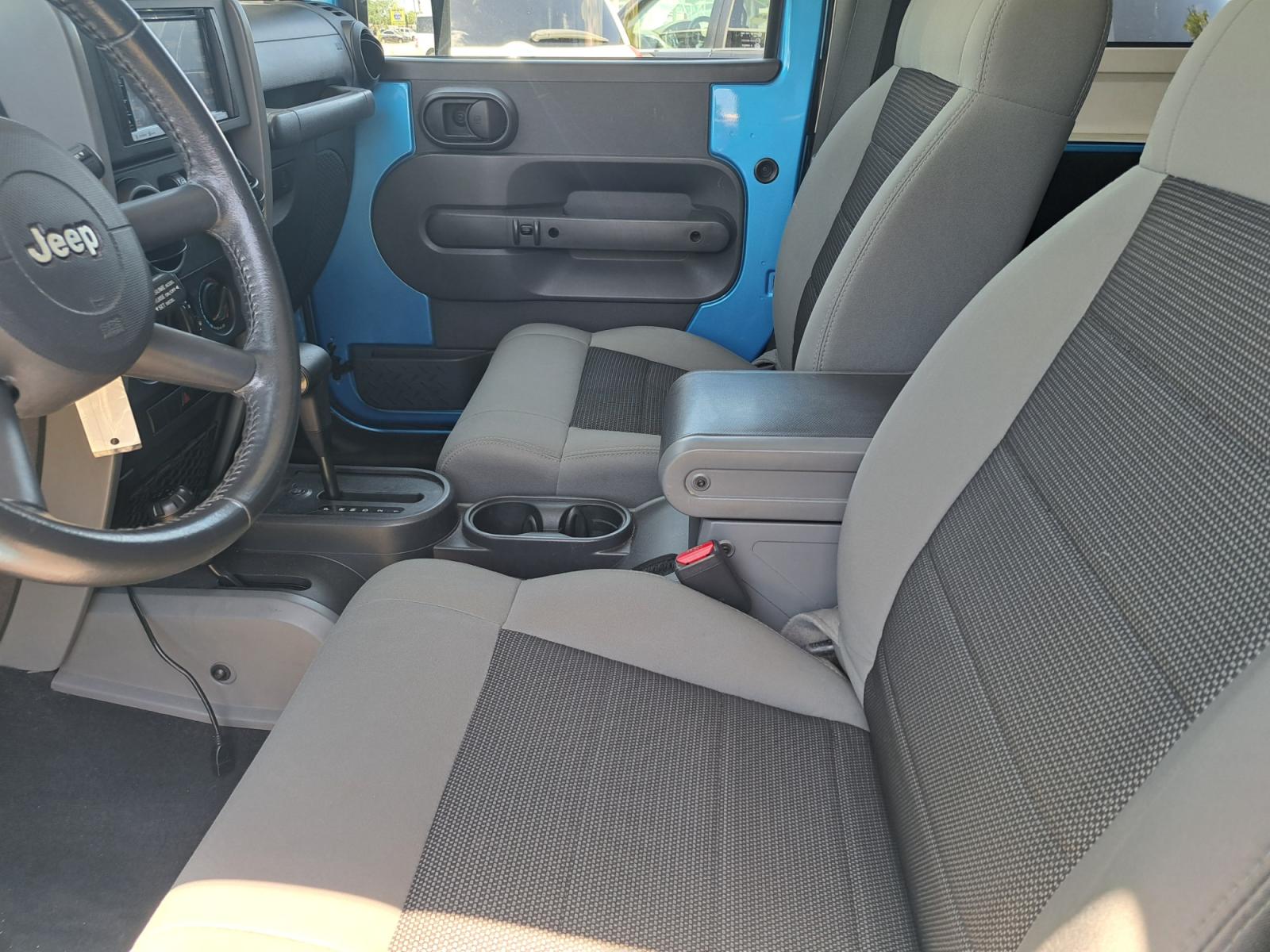 2010 Blue Jeep Wrangler Sport 4WD (1J4AA2D16AL) with an 3.8L V6 OHV 12V engine, Automatic transmission, located at 1181 Aurora Rd, Melbourne, FL, 32935, (321) 241-1100, 28.132914, -80.639175 - Photo #4