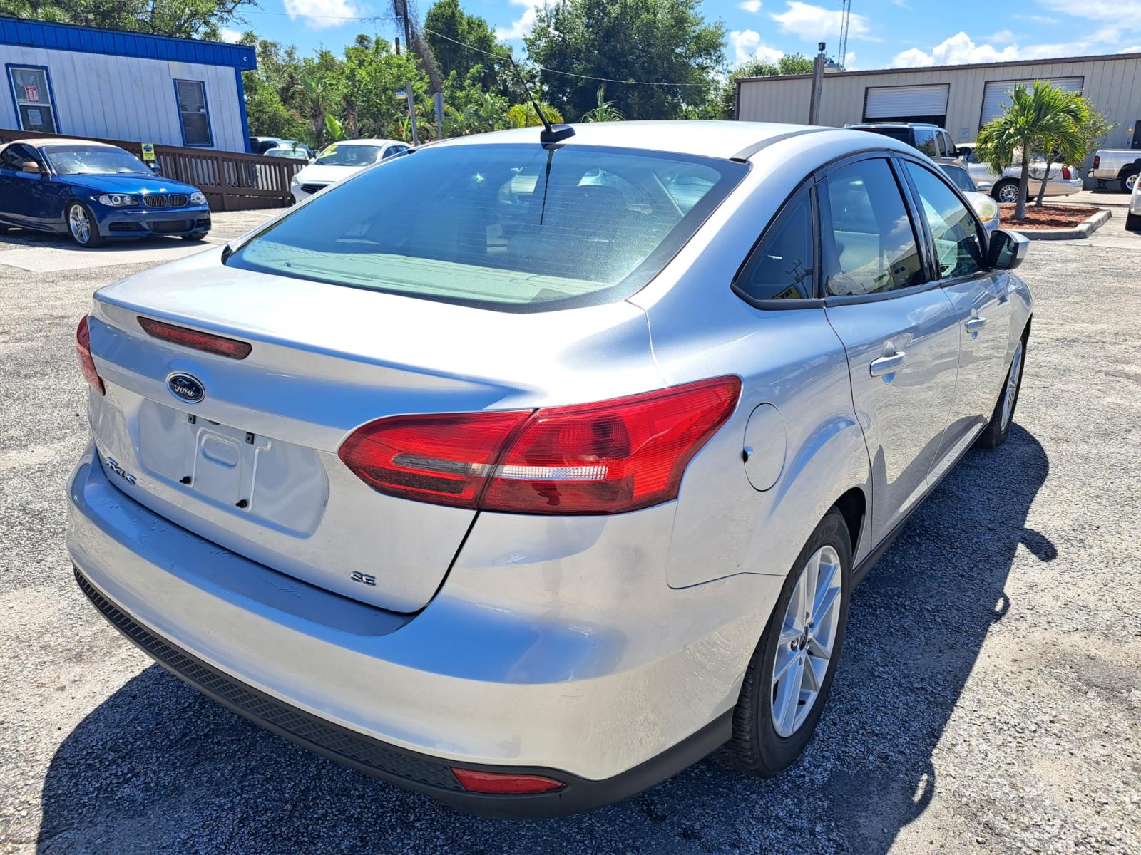 2018 Silver Ford Focus SE Sedan (1FADP3F27JL) with an 2.0L L4 DOHC 16V engine, Automatic transmission, located at 1181 Aurora Rd, Melbourne, FL, 32935, (321) 241-1100, 28.132914, -80.639175 - Photo #1