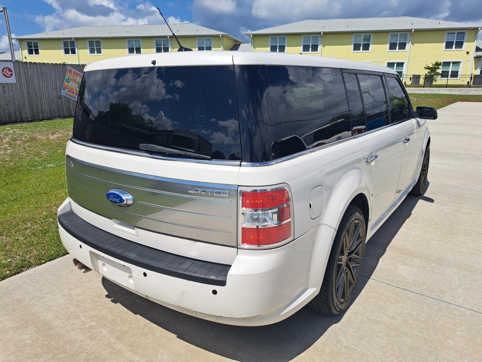 2011 White Ford Flex Limited FWD (2FMGK5DC0BB) with an 3.5L V6 DOHC 24V engine, 6-Speed Automatic Overdrive transmission, located at 1181 Aurora Rd, Melbourne, FL, 32935, (321) 241-1100, 28.132914, -80.639175 - Photo #1