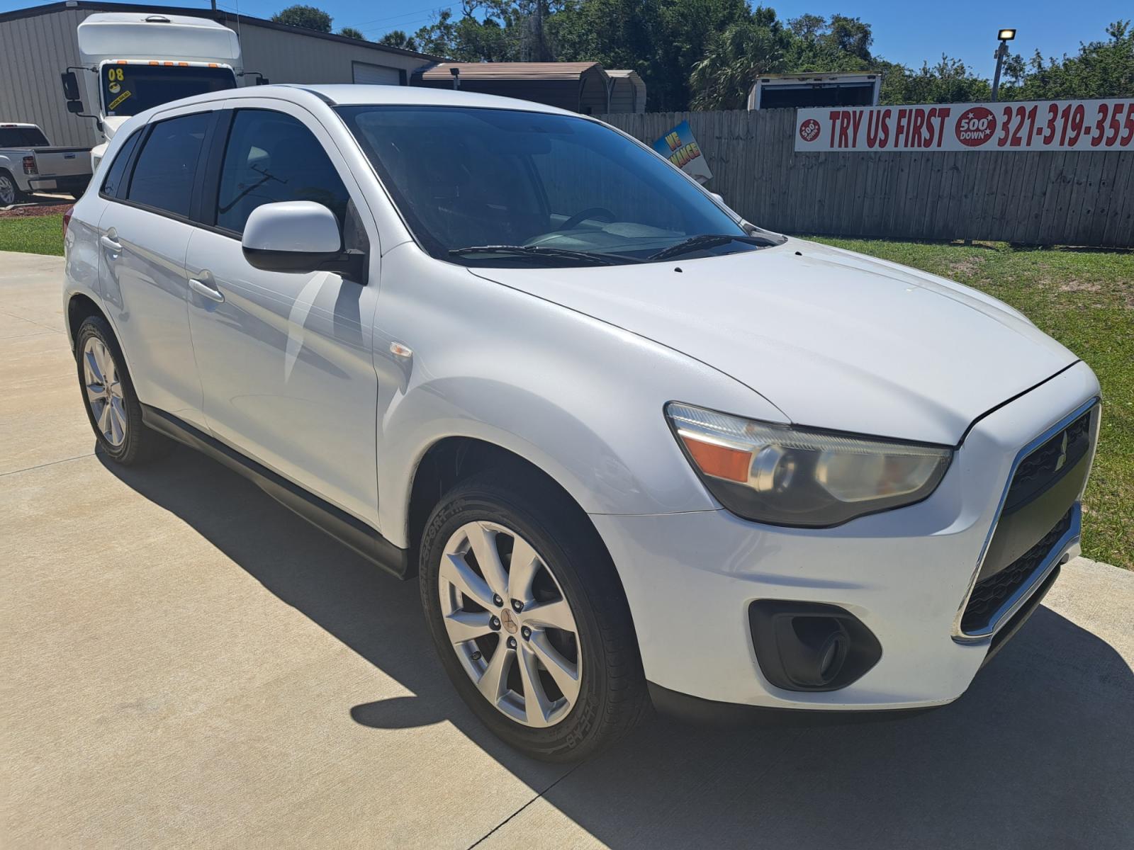 2015 White Mitsubishi Outlander Sport ES 2WD (4A4AP3AU5FE) with an 2.0L L4 DOHC 16V engine, Continuously Variable Transmission transmission, located at 1181 Aurora Rd, Melbourne, FL, 32935, (321) 241-1100, 28.132914, -80.639175 - Photo #2
