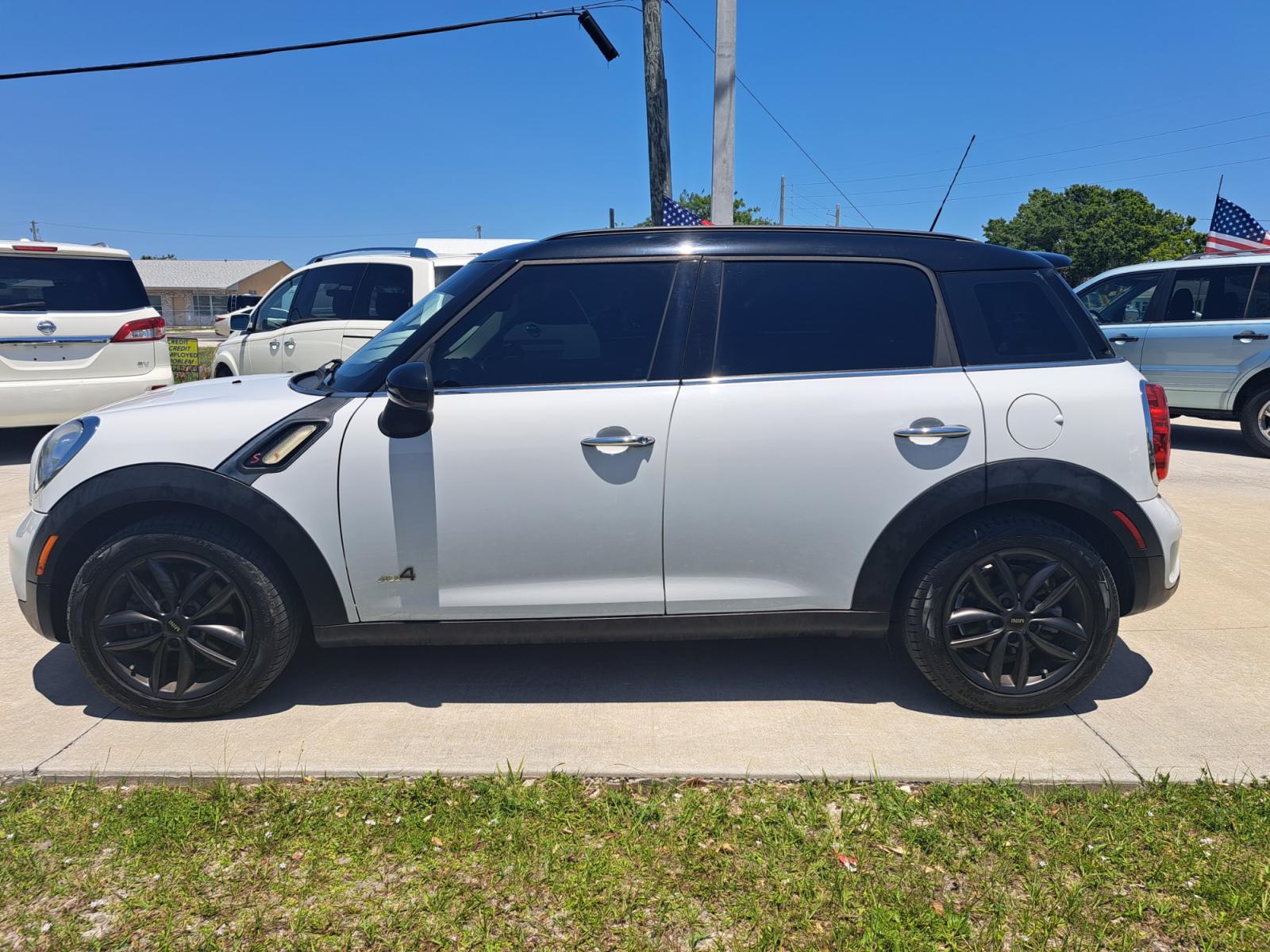 2012 White Mini Countryman S ALL4 (WMWZC5C56CW) with an 1.6L L4 DOHC 16V TURBO engine, Automatic transmission, located at 1181 Aurora Rd, Melbourne, FL, 32935, (321) 241-1100, 28.132914, -80.639175 - Photo #0