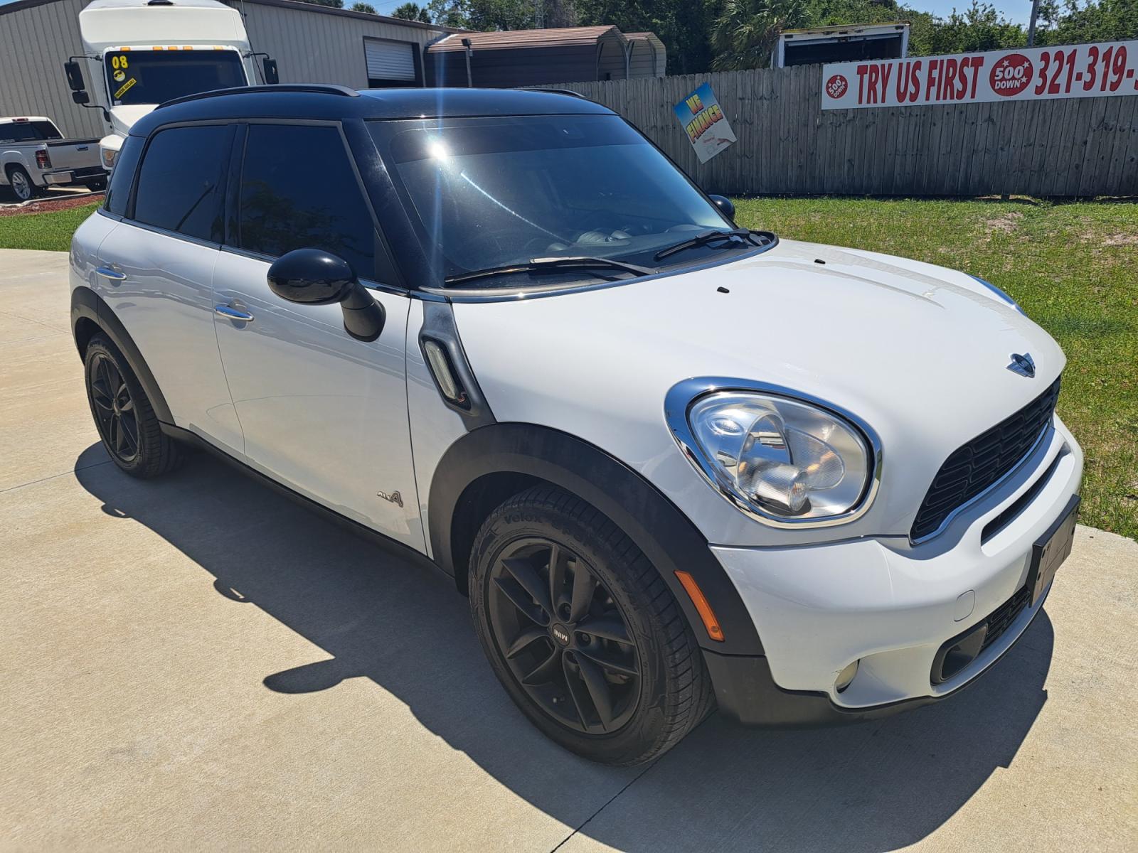 2012 White Mini Countryman S ALL4 (WMWZC5C56CW) with an 1.6L L4 DOHC 16V TURBO engine, Automatic transmission, located at 1181 Aurora Rd, Melbourne, FL, 32935, (321) 241-1100, 28.132914, -80.639175 - Photo #2