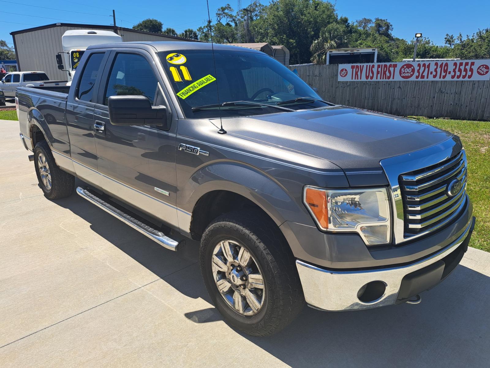 2011 Grey Ford F-150 FX4 SuperCab 6.5-ft. Bed 4WD (1FTFX1ET8BF) with an 3.5L V6 engine, Automatic transmission, located at 1181 Aurora Rd, Melbourne, FL, 32935, (321) 241-1100, 28.132914, -80.639175 - Photo #2