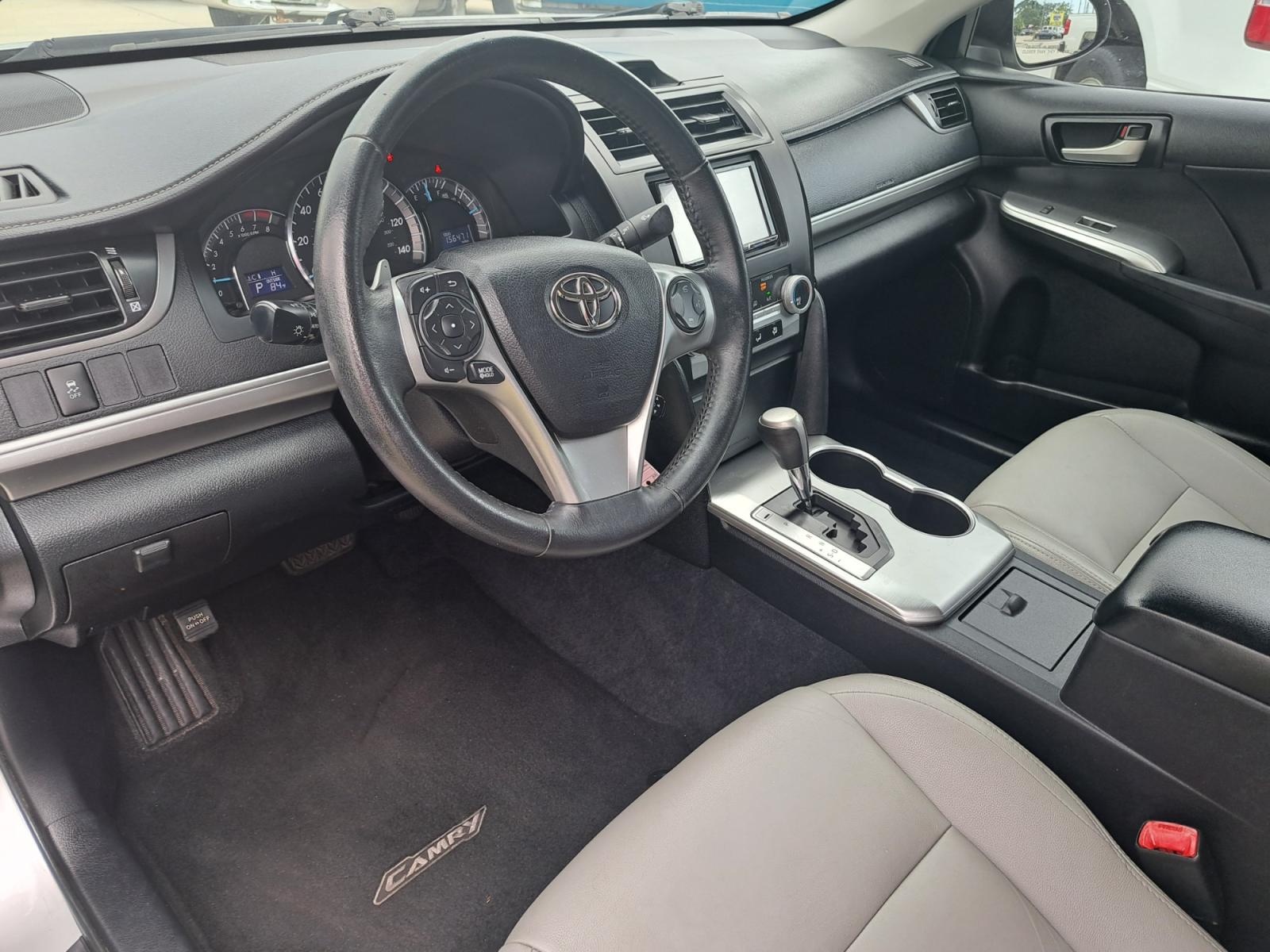 2014 Silver Toyota Camry SE (4T1BF1FK8EU) with an 2.5L L4 DOHC 16V engine, 6-Speed Automatic transmission, located at 1181 Aurora Rd, Melbourne, FL, 32935, (321) 241-1100, 28.132914, -80.639175 - Photo #4