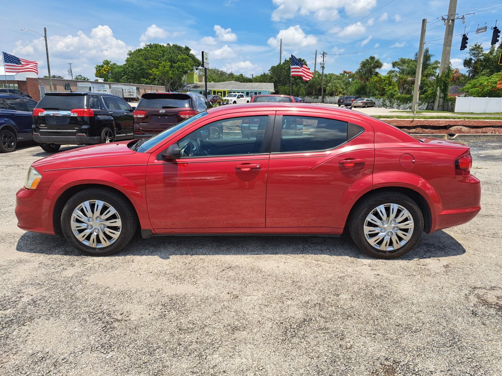 2014 RED Dodge Avenger SE (1C3CDZAB7EN) with an 2.4L L4 DOHC 16V engine, 4-Speed Automatic transmission, located at 1181 Aurora Rd, Melbourne, FL, 32935, (321) 241-1100, 28.132914, -80.639175 - Photo #0