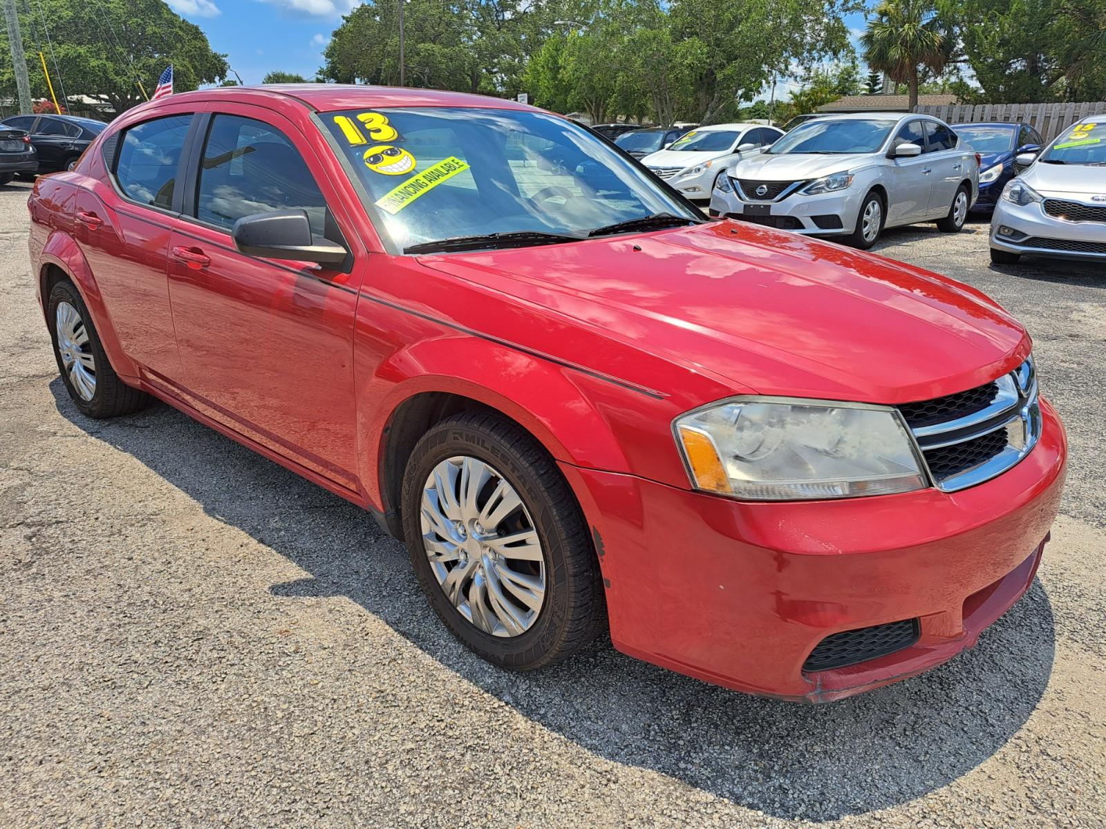 2014 RED Dodge Avenger SE (1C3CDZAB7EN) with an 2.4L L4 DOHC 16V engine, 4-Speed Automatic transmission, located at 1181 Aurora Rd, Melbourne, FL, 32935, (321) 241-1100, 28.132914, -80.639175 - Photo #2