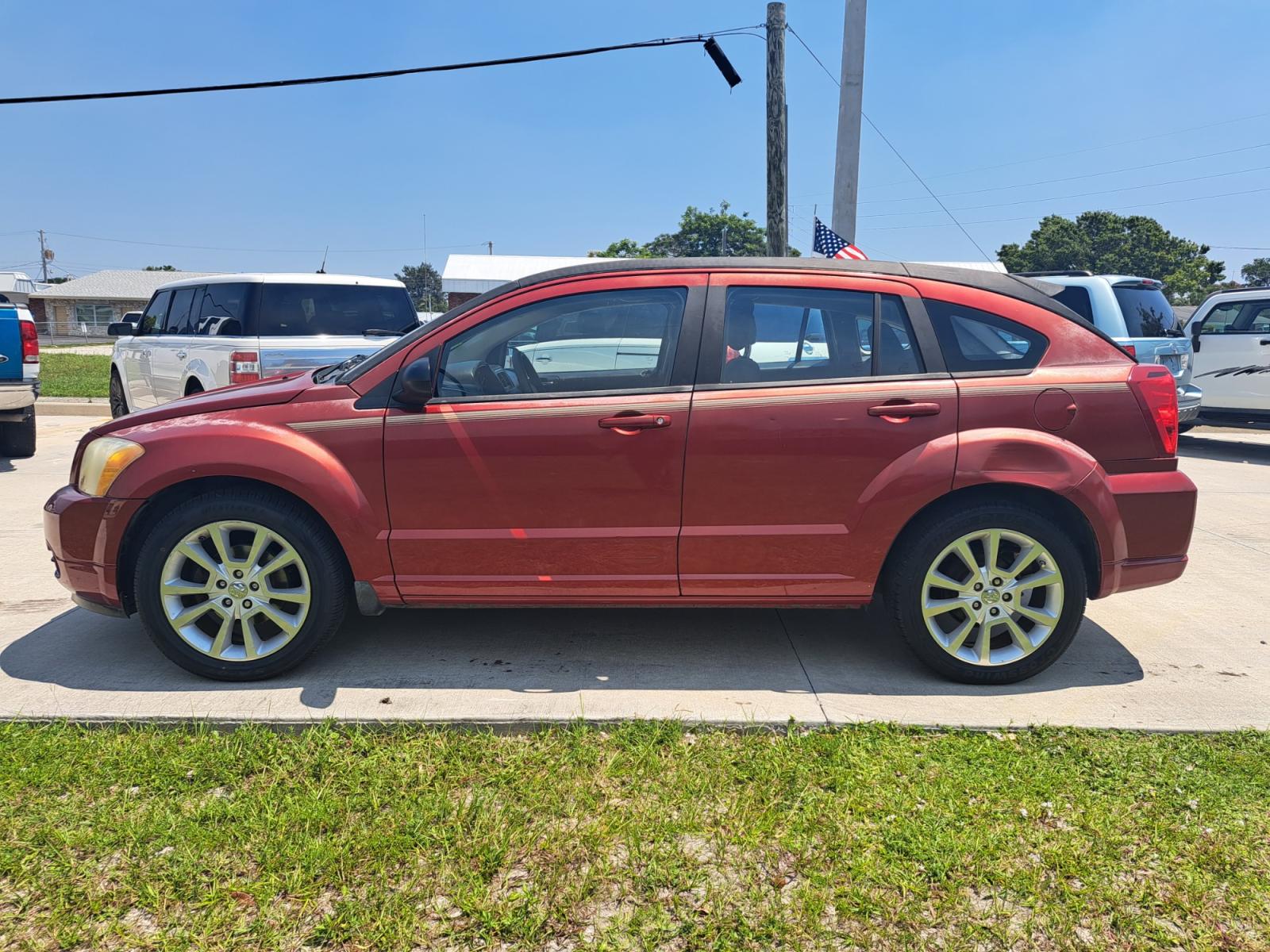2010 RED Dodge Caliber Heat (1B3CB5HA8AD) with an 2.0L L4 DOHC 16V engine, AUTOMATIC transmission, located at 1181 Aurora Rd, Melbourne, FL, 32935, (321) 241-1100, 28.132914, -80.639175 - Photo #0