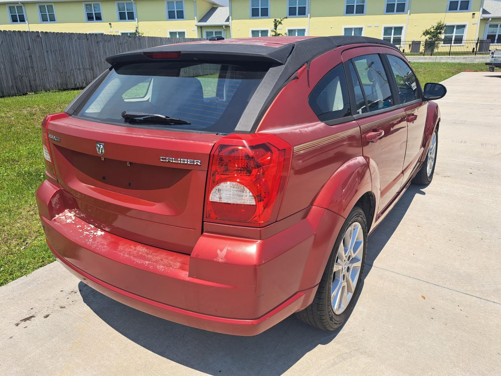 2010 RED Dodge Caliber Heat (1B3CB5HA8AD) with an 2.0L L4 DOHC 16V engine, AUTOMATIC transmission, located at 1181 Aurora Rd, Melbourne, FL, 32935, (321) 241-1100, 28.132914, -80.639175 - Photo #1