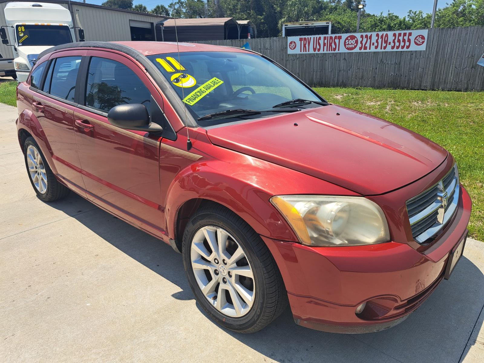 2010 RED Dodge Caliber Heat (1B3CB5HA8AD) with an 2.0L L4 DOHC 16V engine, AUTOMATIC transmission, located at 1181 Aurora Rd, Melbourne, FL, 32935, (321) 241-1100, 28.132914, -80.639175 - Photo #2