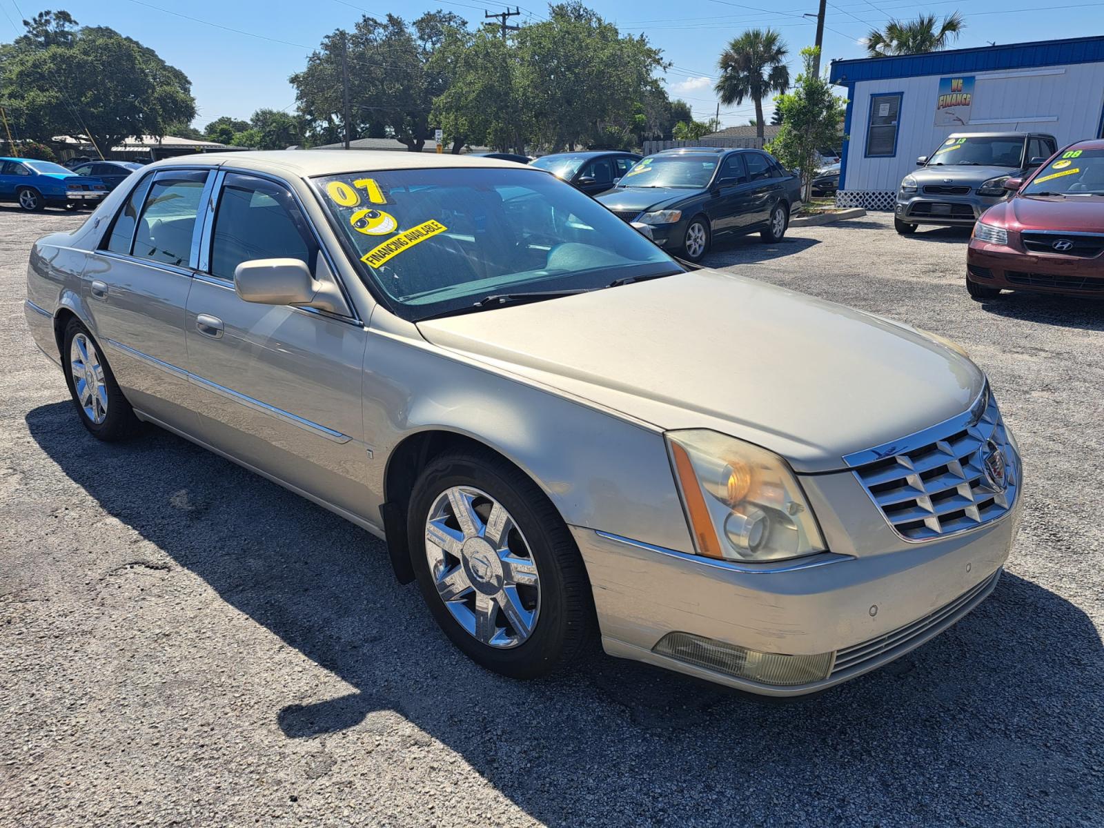 2007 Gold Cadillac DTS Luxury 1 (1G6KD57Y37U) with an 4.6L V8 DOHC 32V engine, 4-Speed Automatic Overdrive transmission, located at 1181 Aurora Rd, Melbourne, FL, 32935, (321) 241-1100, 28.132914, -80.639175 - Photo #2