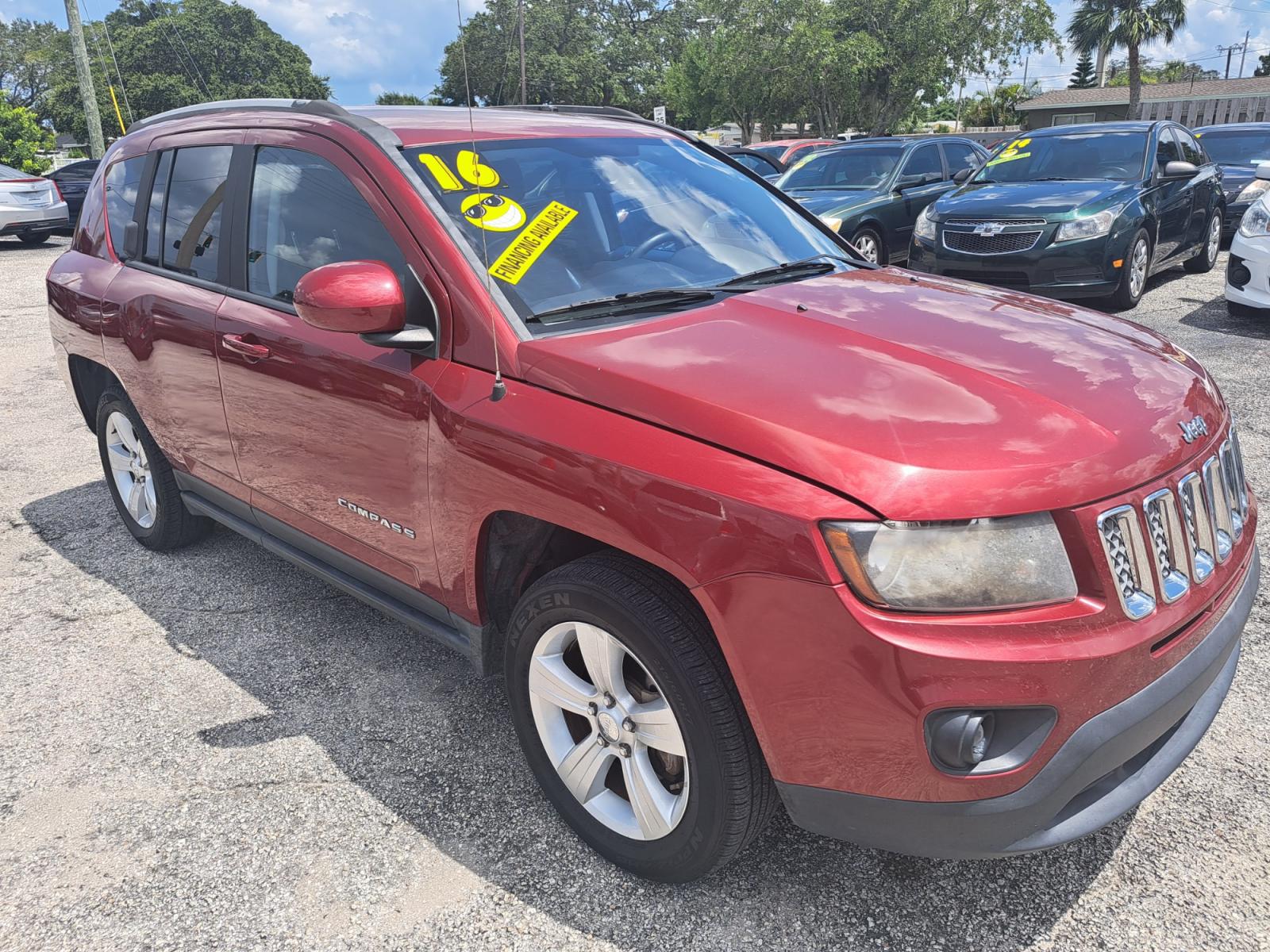 2016 RED Jeep Compass Latitude 4WD (1C4NJDEB4GD) with an 2.4L L4 DOHC 16V engine, 6A transmission, located at 1181 Aurora Rd, Melbourne, FL, 32935, (321) 241-1100, 28.132914, -80.639175 - Photo #2