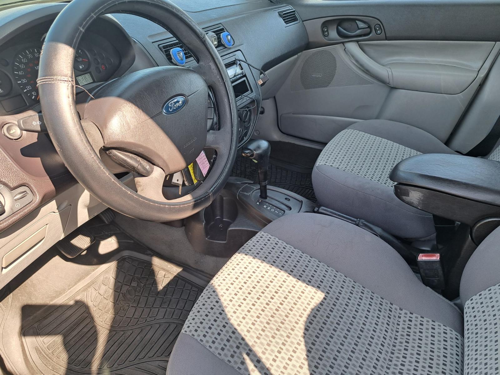 2007 Grey Ford Focus ZX4 S (1FAFP34N17W) with an 2.0L L4 DOHC 16V engine, AUTOMATIC transmission, located at 1181 Aurora Rd, Melbourne, FL, 32935, (321) 241-1100, 28.132914, -80.639175 - Photo #3