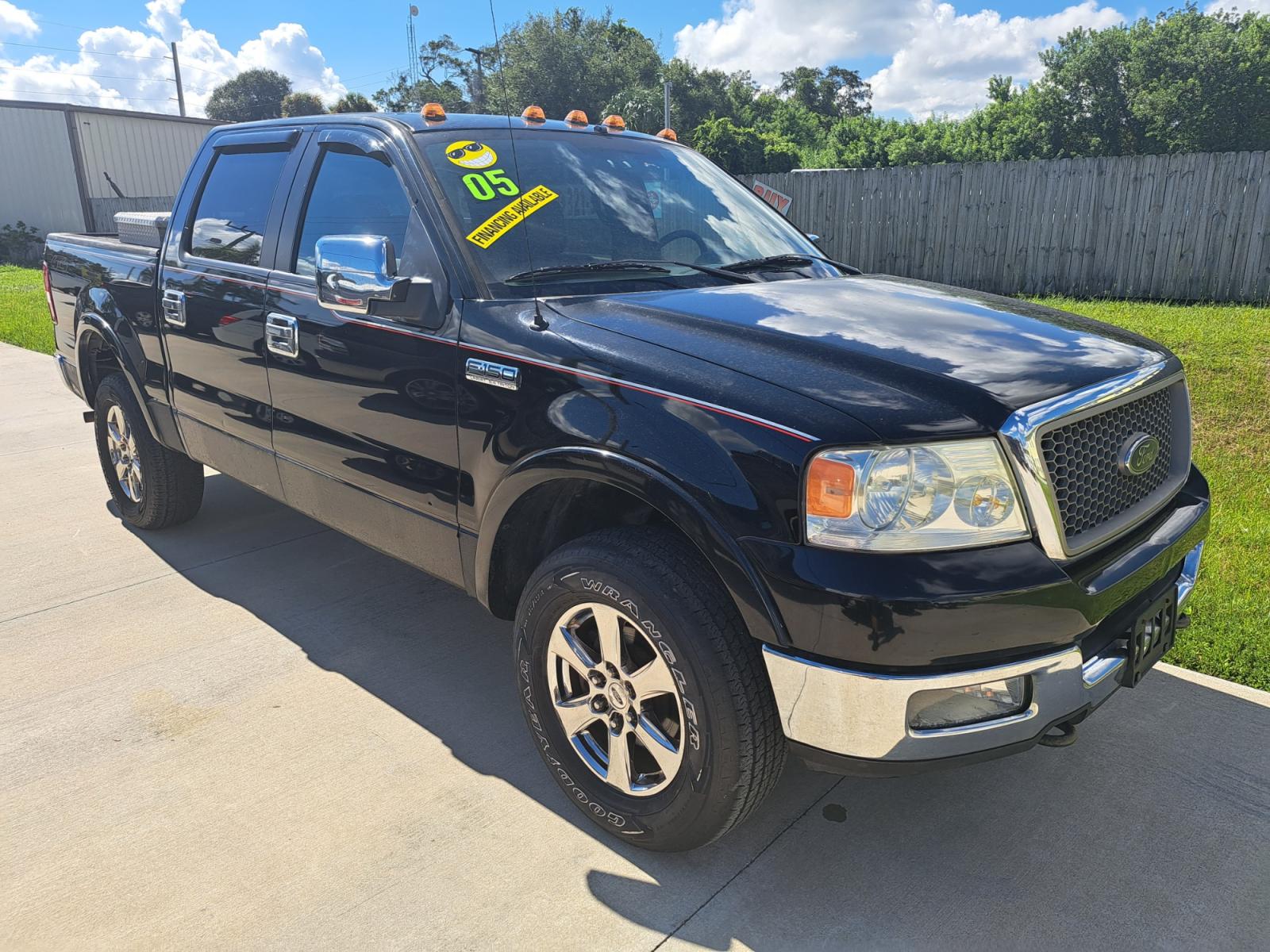 2005 Black Ford F-150 FX4 SuperCrew 4WD (1FTPW14575K) with an 5.4L V6 SOHC 16V engine, 4-Speed Automatic Overdrive transmission, located at 1181 Aurora Rd, Melbourne, FL, 32935, (321) 241-1100, 28.132914, -80.639175 - Photo #2
